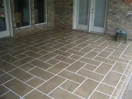 Cementitious overlay patio with ashlar stone pattern in warm earth tones